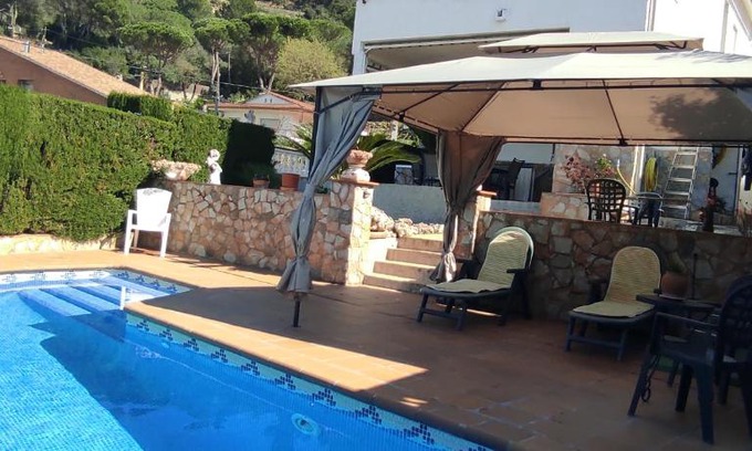 Sant Fost de Campsentelles Apartment | Elegant Oceanfront Apartments in Barcelona with Pool Access