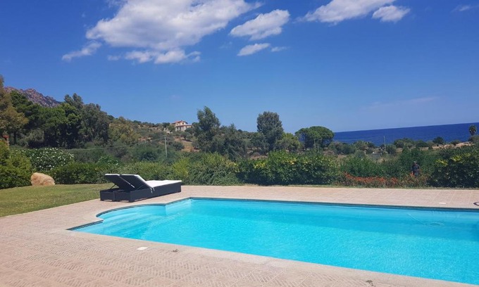 Tertenia Resort | Discover Abba Urci: Oceanfront Escape with Pool & Hot Tub