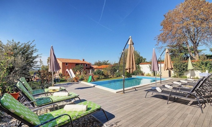 Kanfanar Apartment | Unwind in a Poolside Apartment Above the Limfjord
