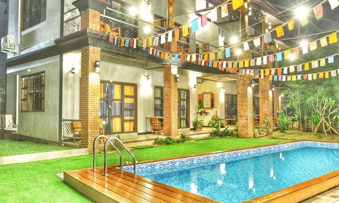 Mae Sariang House | Above the Sea Guesthouse: Family-Friendly with Pool Access