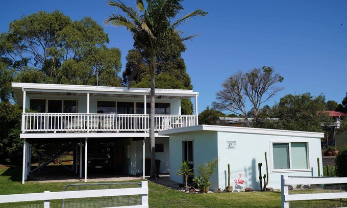 Loch Sport House | Inviting Beachfront Retreat with Pool and Lake Views