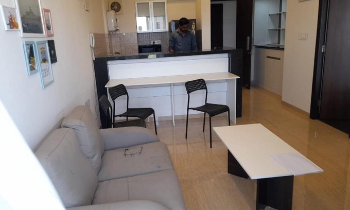 Kadadhe Apartment | Cozy 1BHK Flat with Golf Park Views in Lodha Belmondo
