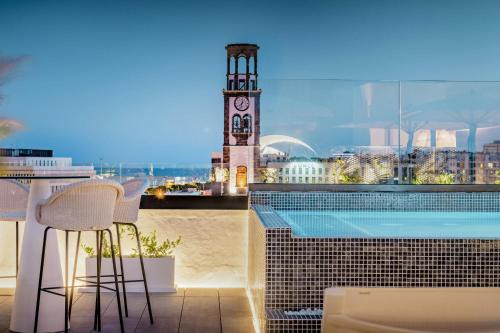 Santa Cruz de Tenerife Hotel | Experience AC Hotel by Marriott Tenerife: 4-Star Comfort & Pool