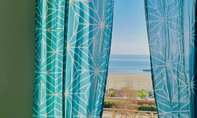 Nettuno Apartment | Seaside Retreat in Historic Art Nouveau Building