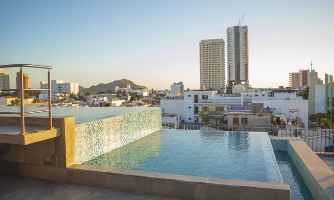 Zona Dorada Apartment | Cozy and Central Apartment with Spa & Breakfast Options