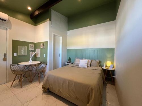 Niteroi Apartment | Cozy Green Suite: Pet-Friendly with Breakfast Included