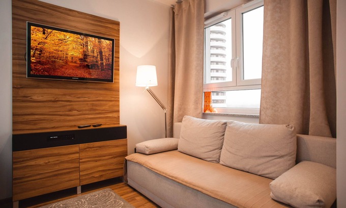 Katowice Apartment | Cozy ActivPark Apartments: 4-Star Stay with Family Amenities