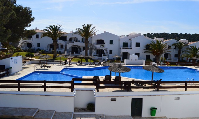 Port d'Addaia Apartment | Serene Addaia: Oceanfront Haven with Pool & Spa Amenities