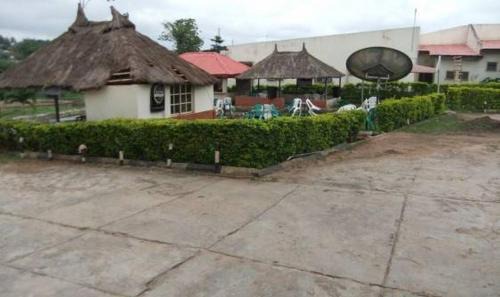 Akure Apartment | Cozy Room in Apartment - Ade Super Hotel with Pool Access