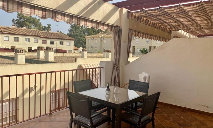 Isla Cristina Apartment | Inviting Oceanfront Escape at Adosado Campo de Golf