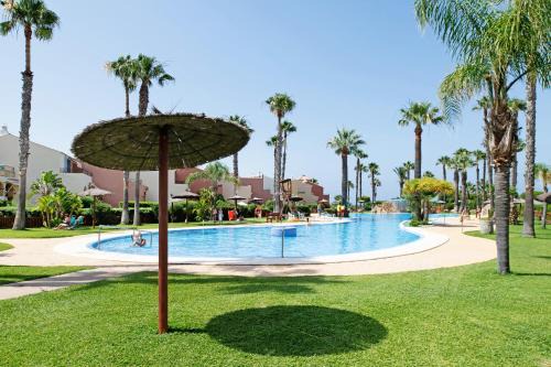 Atlanterra House | Inviting Adosado Jardines de Zahara with Oceanfront Pool
