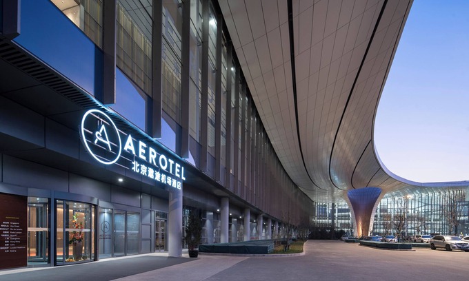 Daxing Hotel | Discover Aerotel: Poolside Retreat with Family-Friendly Perks