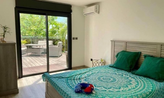 Les Avirons Apartment | Cozy Duplex with Pool, Sea View, and Family-Friendly Amenities