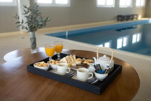 Trelew Hotel | Pet-Friendly Aguada Hotel with Breakfast & Hot Tub Access