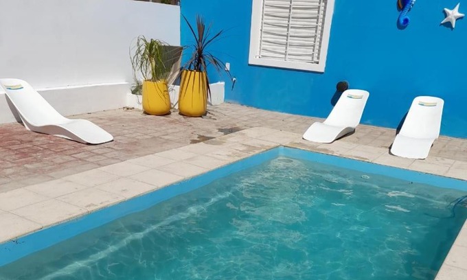 Las Grutas Apartment | Family-Friendly Aguamarina with Pool & Kitchen Amenities
