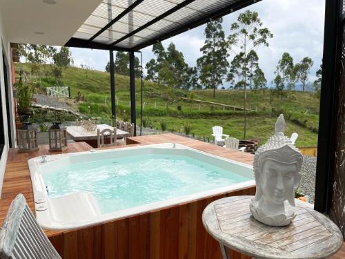 Filandia Cabin | Exceptional Aguas Claras Hospedaje with Spa & Hot Tub