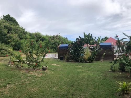 Capesterre-de-Marie-Galante Ski Chalet | Stunning Aichi Lodges with Ocean Views and Pool Access