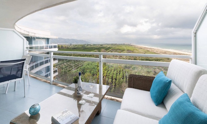 Playa de Gandia Apartment | AG AIGUABLAVA: Ocean View, Pool & Perfect Guest Rating