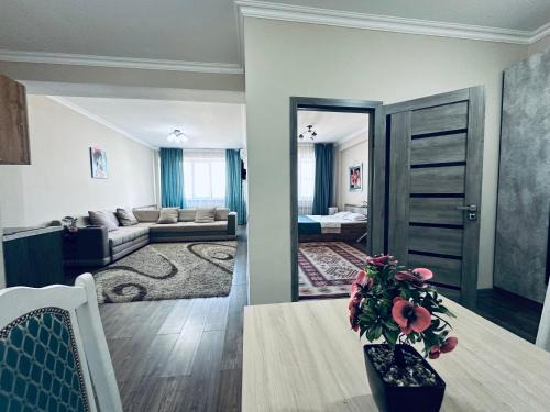 Almaty Apartment | Perfect Getaway: Ailyn Apartments with Family-Friendly Amenities