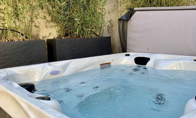 Carcassonne House | Cozy Townhouse with Hot Tub and Spa Amenities for Relaxation