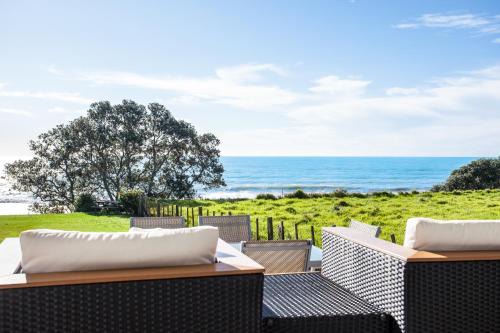 Te Kaha House | Seaside Escape at Airi Kainga with Private Beach & Ocean Views