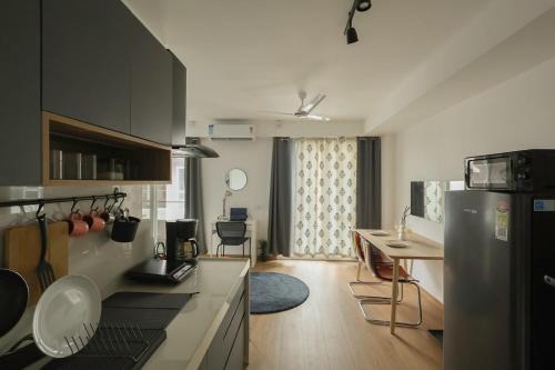 Viman Nagar Apartment | Airport Runway View from terrace,Coffee Maker,Luxe