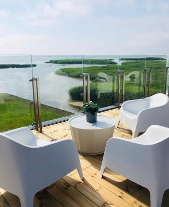 Klaipeda District Municipality Apartment | Pet-Friendly Aitvarai 41: Rated 9/10 for Families