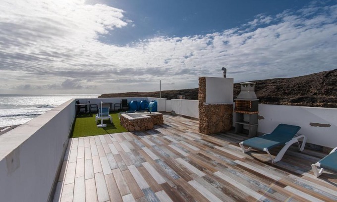 Ajuy Apartment | Ajuy Paradise: Oceanfront Family Retreat with Great Ratings