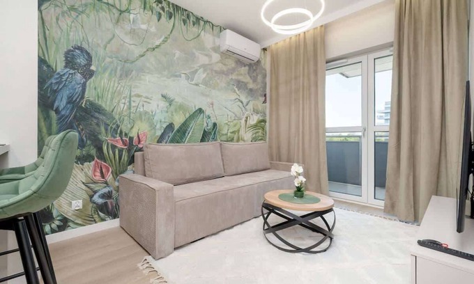 Rzeszow Apartment | Al. Kopisto 11: Balcony Retreat with Parking & Air Conditioning
