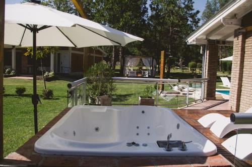 Nono Apartment | Al Rio Suites: 4-Star Escape with Pool and Hot Tub