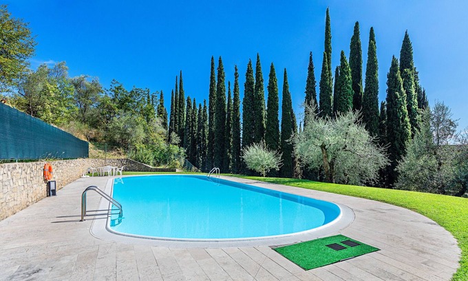 Gardone Riviera Apartment | Pet-Friendly Retreat at Al Vittoriale 3 with Pool Access