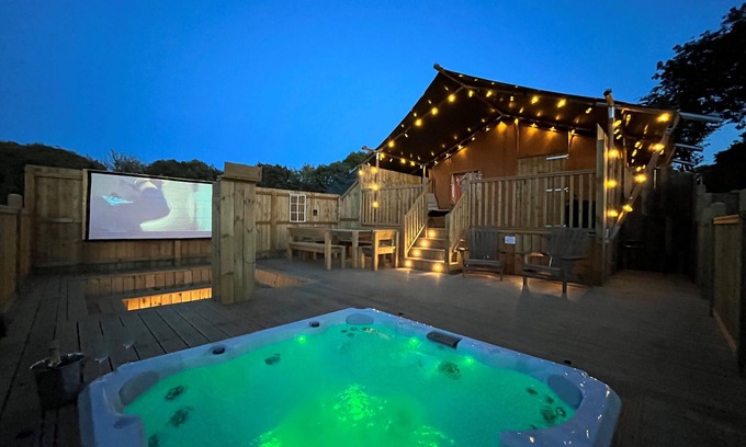 Tenby RV Rental | Experience the Aladdin Safari Tent: Pet-Friendly & Spa Retreat