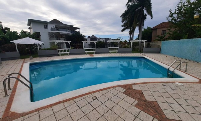 IronShore Estates Cottage | Experience Alamanda Cottage: Oceanfront Retreat with Pool
