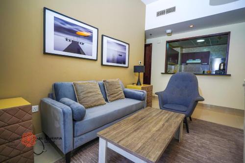 Dubai Sports City Apartment | Cozy Alashrafia Saray: 1BR Apartment with Ocean View