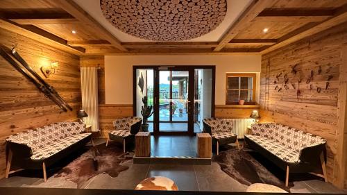 Passo Rolle Hotel | Discover Albergo Vezzana: Pet-Friendly & Family-Oriented Stay