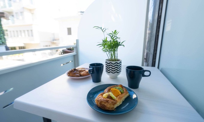 Marina Centro Hotel | Discover Aldebaran: Family-Friendly with Restaurant & Kitchen