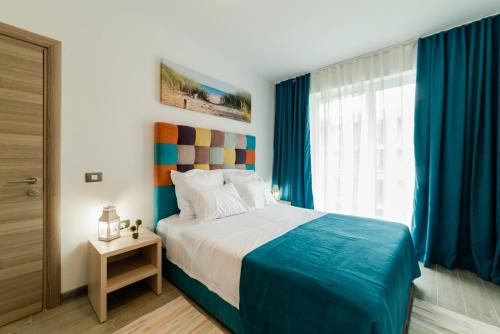 Mamaia-Sat Apartment | Relaxing Alezzi Beach Apartment with Oceanfront Amenities