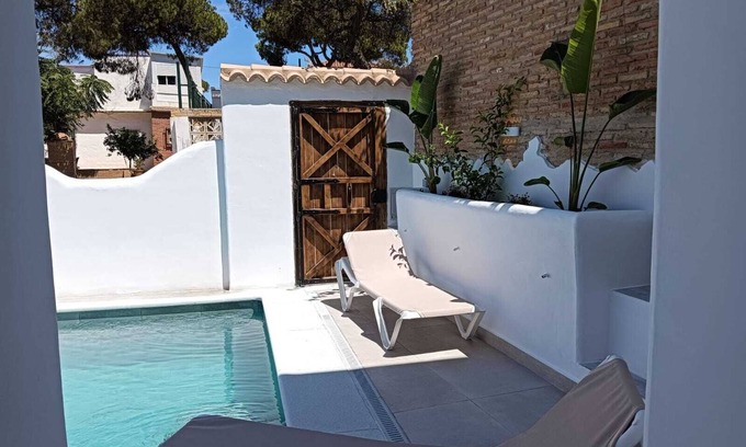 Punta Umbria Ski Chalet | Relax at Alhamar House with Private Pool & Pet Friendly Options
