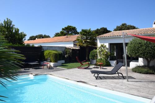 Rivedoux-Plage House | Alizé: Elegant Home with Heated Pool for Memorable Stays