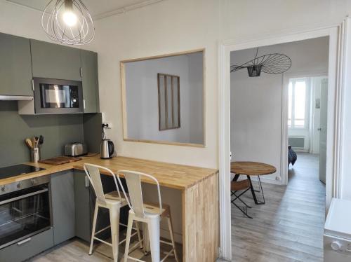 Zola Apartment | Convenient Location: Explore Shops Just Steps Away