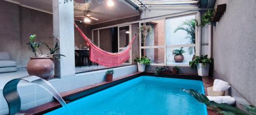 Sao Paulo House | Allianz Parque: Poolside Relaxation & Shopping Excitement
