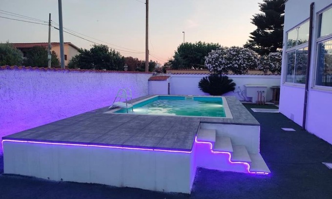 Focene Villa | Convenient Getaway: 7 Min from Airport with Pool & Hot Tub