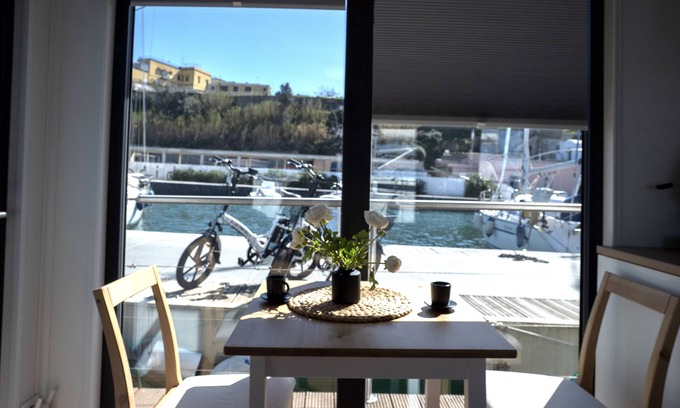 Procida Boat Rental | Experience Almalo Floating House: Oceanfront Bliss Awaits