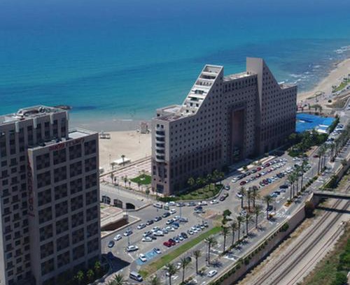 Haifa Apartment | Explore Almog Tower: Oceanfront Retreat with Pool