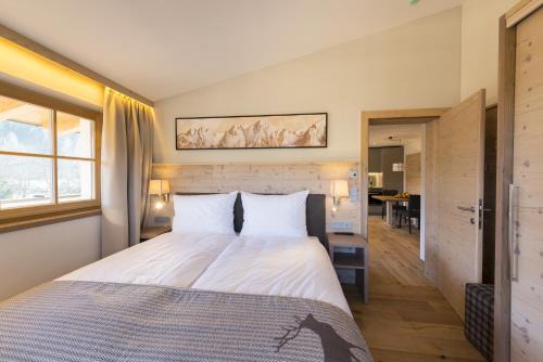 Kirchberg in Tirol Apartment | Pet-Friendly Alpen Chalet Dorfwies with Hot Tub & 9.7 Rating
