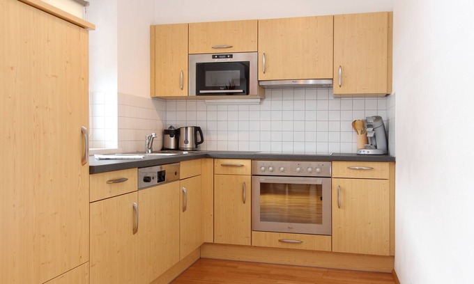 Kaprun Apartment | Explore Alpine Resort: Top-Rated Stay with Spa & Kitchen