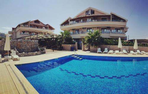 Marmara Hotel | Discover Altinkum Tatil Konakları with Private Beach Access