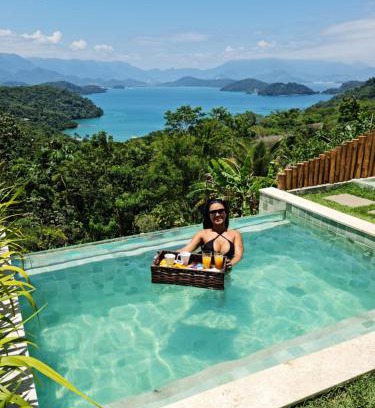 Mambucaba House | Discover Alto da Piraquara Flat: Oceanfront Family Retreat