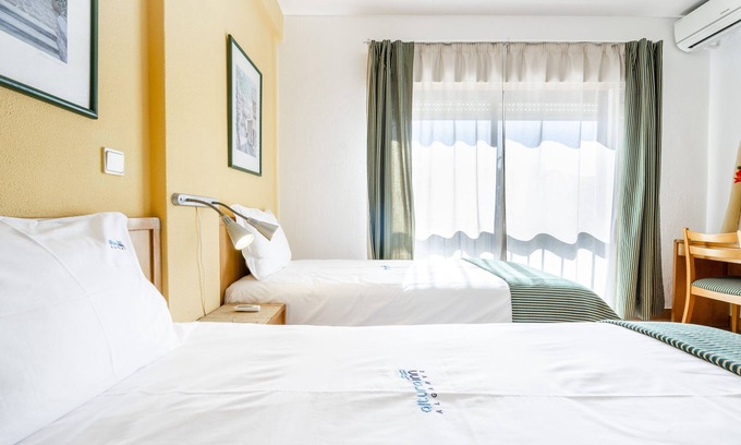 Altura Apartment | Beachfront Altura Inn: Ocean Views & Free Wifi Awaits!
