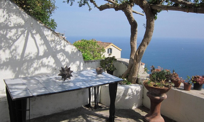 Raito House | Seaside Retreat: Characteristic White House with Seaview Terrace